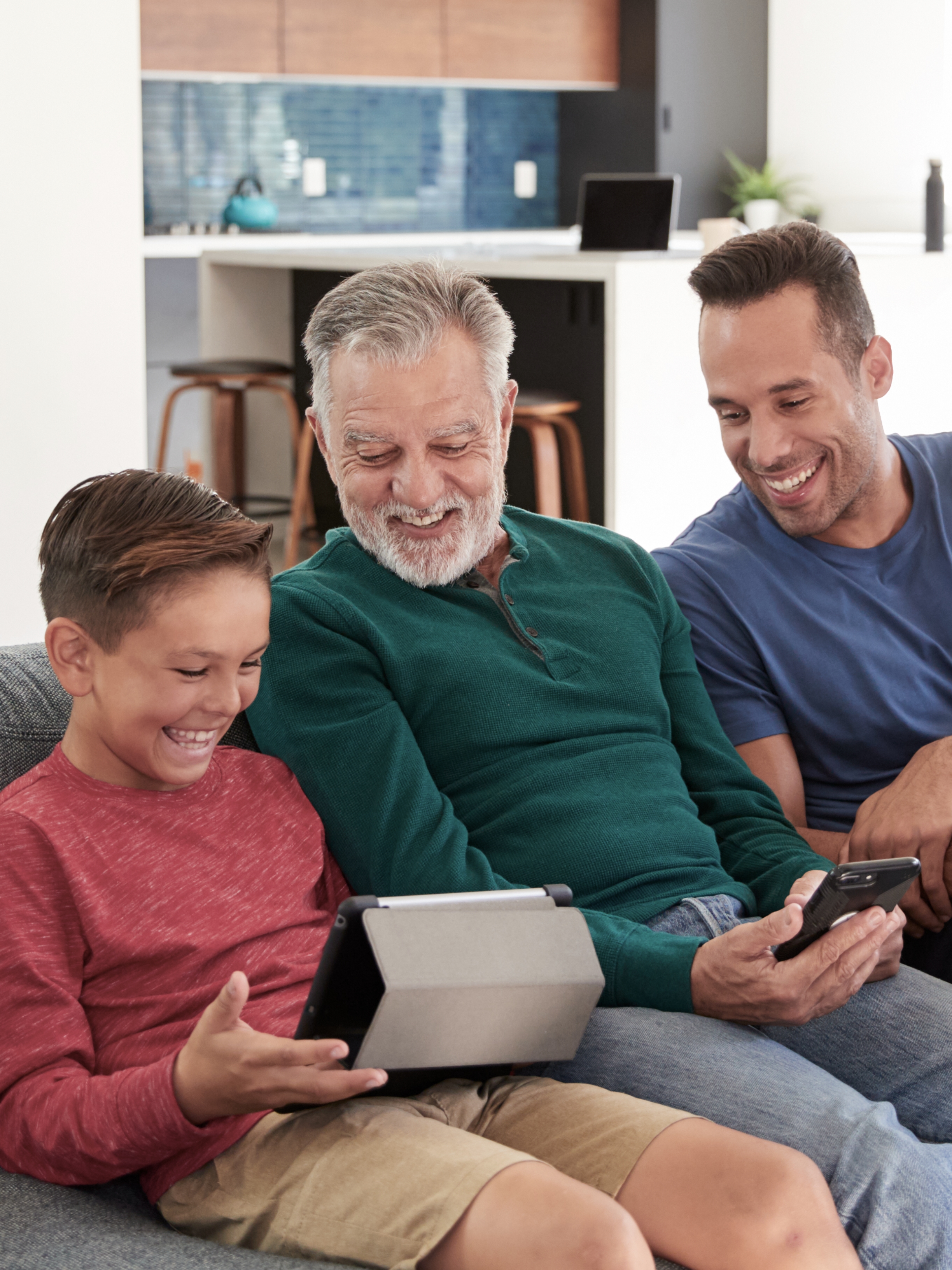 Grandparent and grandchild watching birds together
